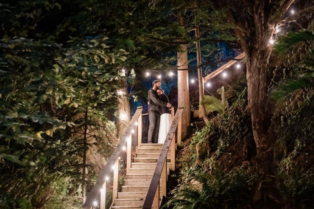 This is a picture of a bride and groom walking up to their unique microwedding accommodations